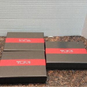 Three Tumi Black and Red Key & Card Holder Boxes...EUC